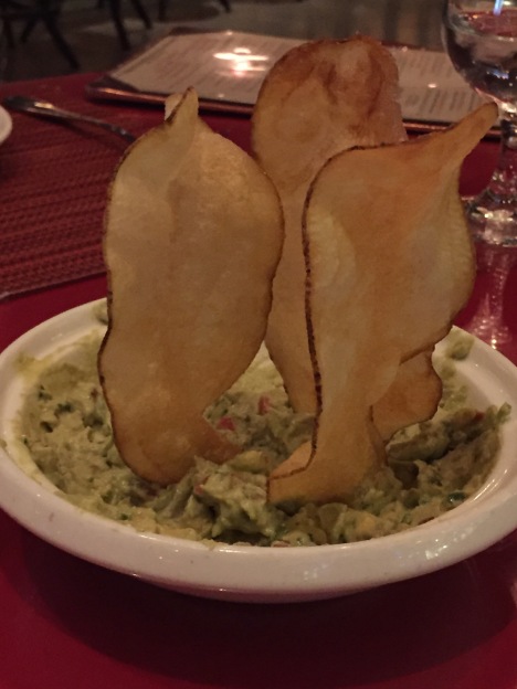 Guac with homemade chips.